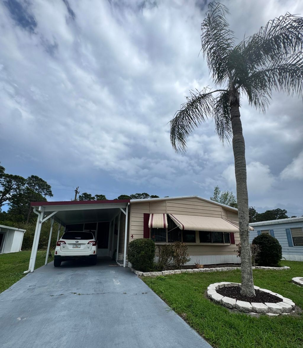 Photo of 4 Felicidad Court, Fort Pierce, FL 34951 (MLS # B26002403)