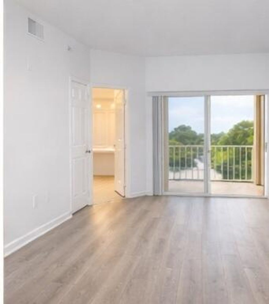 Beautiful 3BR/2BA lakeview condo in a gated Wellington community zoned for top-rated schools. This bright, spacious unit features newer luxury vinyl flooring, a large living room, and a private balcony overlooking the lake. The split floor plan offers ideal privacy, with a generous primary suite featuring a walk-in closet and en-suite bath. Kitchen includes granite countertops and ample cabinetry. Full-sized washer and dryer in unit. Private garage included. Enjoy a wonderful community pool, fitness center, and prime location near shopping, dining, and equestrian venues. Available for annual rental.