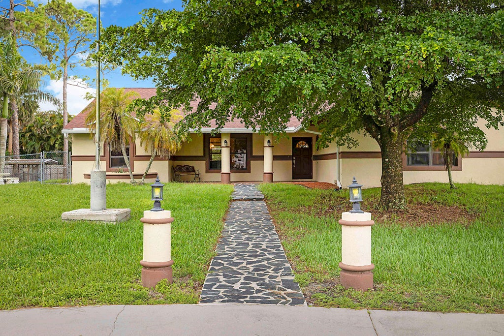 Photo of 17298 66th Court N, The Acreage, FL 33470 (MLS # B26050332)