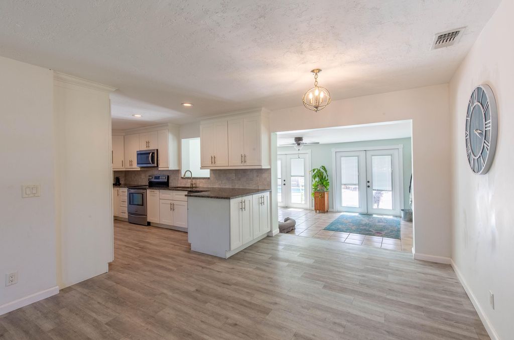Photo of 12069 Easterly Avenue, Palm Beach Gardens, FL 33410 (MLS # B26033346)