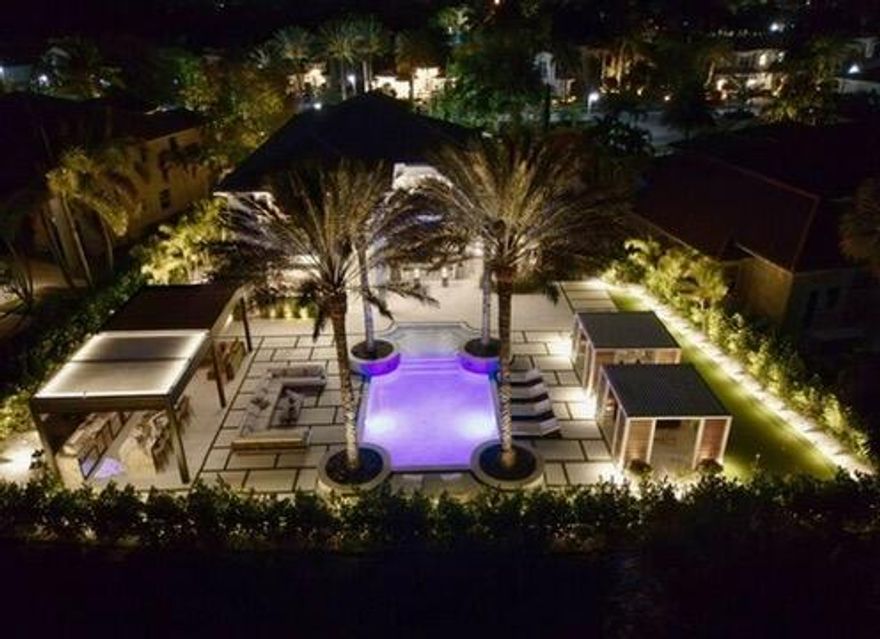 Experience resort-style living in this fully redesigned, move-in-ready, opulent luxury estate within the prestigious Jupiter Country Club. This 5-star, magazine-worthy residence blends modern sophistication with timeless, refined elegance and showcases a level of finish rarely found in the market.

Interior Highlights:
Step into an architectural, designer-curated chef's kitchen featuring quartz countertops and backsplash, premium Thermador & Lynx appliances, a built-in coffee maker, and a gas range, perfect for both everyday living and elevated entertaining. Grand ceilings and sumptuous, ultra-high-end fixtures and finishes create an atmosphere of elevated serenity throughout the home. The spacious primary suite resides in its own private wing, offering pristine natural light and a luxe sense of retreat. The home is fully equipped with advanced smart-home technology, mesh Wi-Fi, an integrated camera system, and six Samsung Frame TVs. Additional upgrades include a custom artisan dry bar, high-end LVP flooring, upgraded spa-like bathrooms, marble detailing, a new roof, HVAC, water softener with UV purification, and a backup gas generator.

Outdoor Oasis: 
Your private outdoor sanctuary is a show-stopping, resort-grade paradise, truly like living in a permanent luxury vacation destination. The stunning 40' designer saltwater pool features 11 fountains, an 11' sun shelf, white tile, and a stone/turf deck. A custom-built pergola with sunshades anchors the space, complemented by a bespoke, chef-level outdoor Lynx kitchen with quartzite waterfall islands, hibachi grill, wine and beverage fridges, ice maker, and more.
Two handcrafted luxury cabanas, each designed with TVs and Brazilian wood accents frame the impressive 60' turf putting green. Newly curated, lush landscaping and custom lighting surround the home, providing enhanced privacy, ambiance, and resort-style tranquility.

Community & Location:
Jupiter Country Club offers exceptional amenities including a 24/7 manned gated entry with hourly patrols, a Greg Norman signature golf course, clubhouse, resort pool, tennis, pickleball, fitness center, and yoga studio.
Nestled in a prime, sought-after location just minutes from pristine beaches, shopping, dining, top-rated schools, I-95, the Florida Turnpike, and PBI airport, this home embodies the pinnacle of the Florida luxury lifestyle.