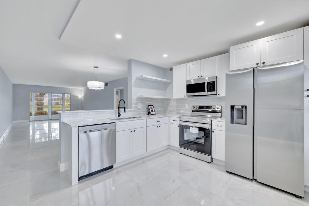 Photo of 2304 Lucaya Ln #M1, Coconut Creek, FL 33066 (MLS # F10434718)