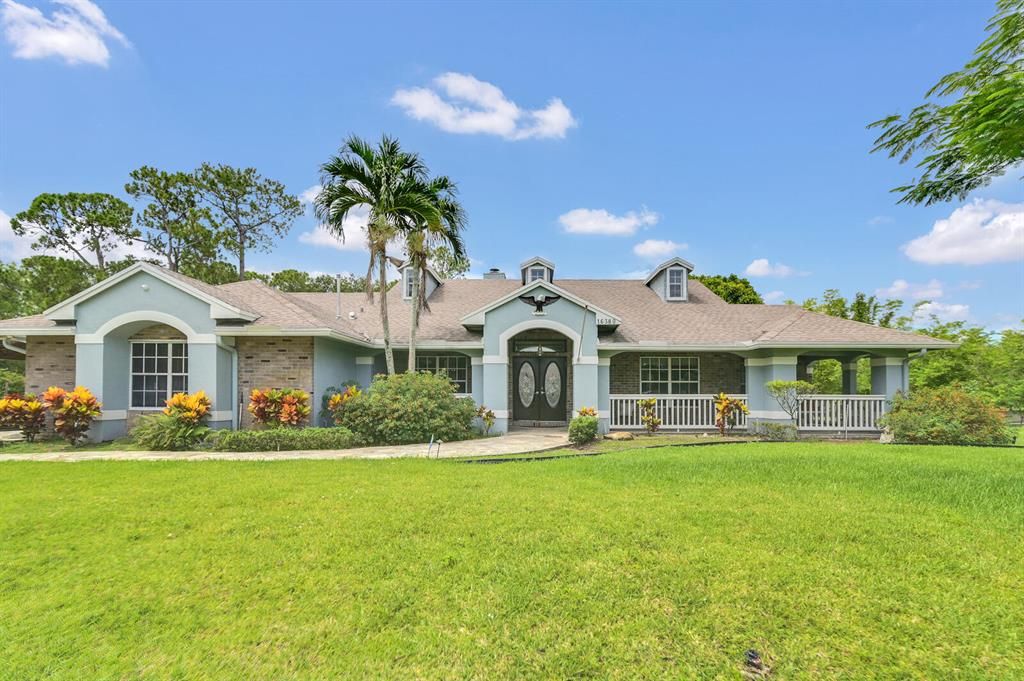 Photo of 16380 67th Court N, The Acreage, FL 33470 (MLS # R10813002)