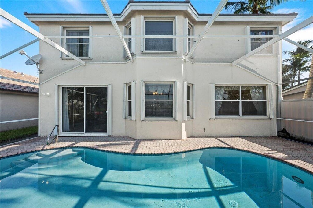 Photo of 7639 Northtree Club Drive, Greenacres, FL 33467 (MLS # B26089215)