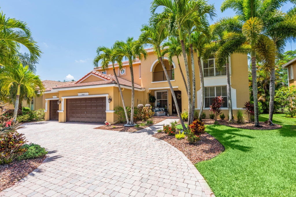 Photo of 10671 CYPRESS LAKES PRESERVE Drive, Lake Worth, FL 33449 (MLS # B26068288)