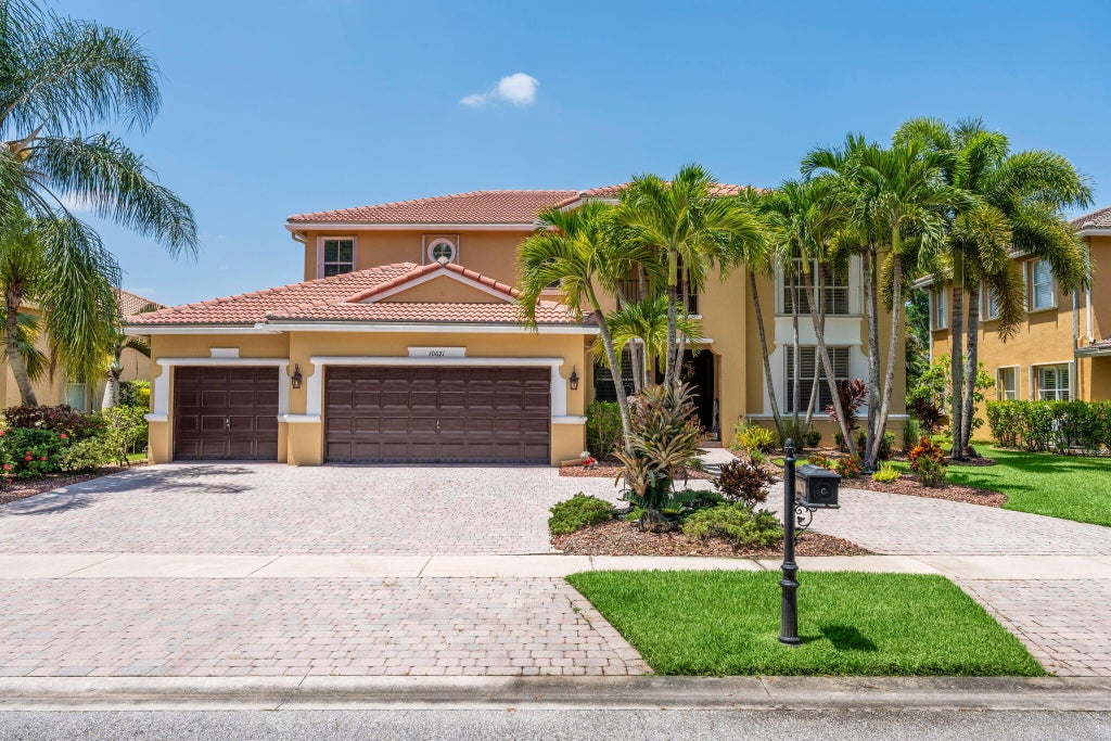 Photo of 10671 CYPRESS LAKES PRESERVE Drive, Lake Worth, FL 33449 (MLS # B26068288)