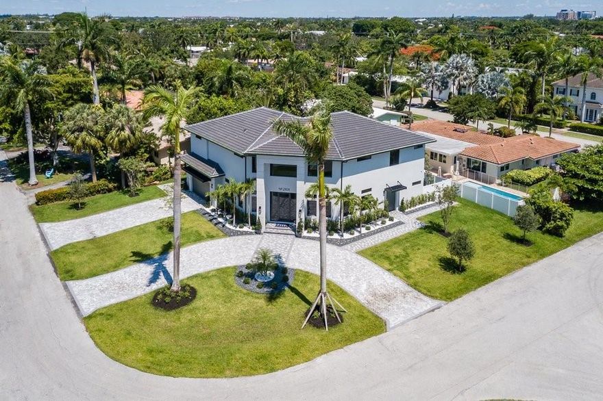 Brand New Construction 5BR/5BA home on a 10,000 SF Corner Lot & less than a mile walk to Fort Lauderdale's A rated Public School, Bayview Elementary. Great location across from waterfront homes. Open and volume floorplan w. 20ft ceilings as you enter, views straight through to the back yard, 2nd story entertainers loft w/wet bar. Gourmet kitchen w. Café Appliances, wine fridge and two-tone cabinetry. Expansive primary suite features private balcony, spa-like shower, and large walk-in closet. Saltwater pool and lush landscaping. Spacious 2 car garage with separate bonus garage for golf cart or storage. Tons of parking with circle drive and garages. Minutes to beaches, shopping and dining. 1 Mile to Galleria Mall, 1.5 Miles to the Ocean, under 2 Miles to Las Olas Night Life and Shopping.