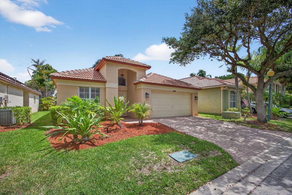 Photo of 5008 Elpine Way, Riviera Beach, FL 33418 (MLS # R11100025)