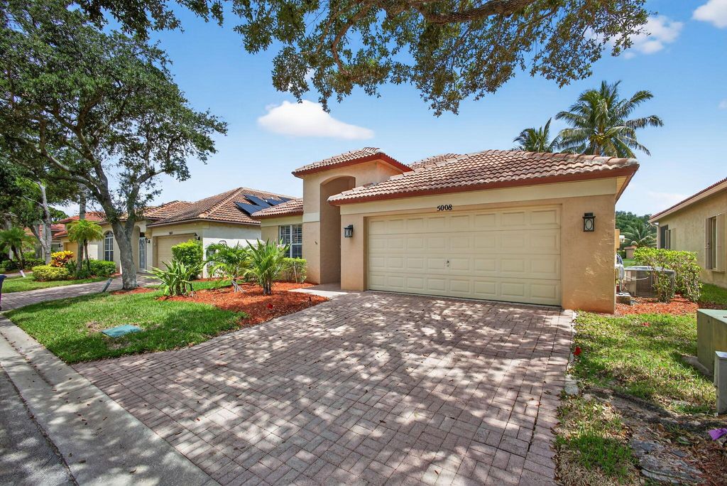 Photo of 5008 Elpine Way, Riviera Beach, FL 33418 (MLS # R11100025)