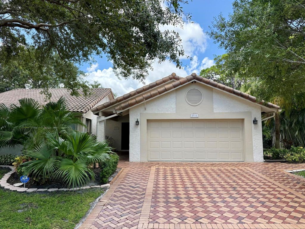 Photo of 2711 NW 26th Circle, Boca Raton, FL 33431 (MLS # R11115705)