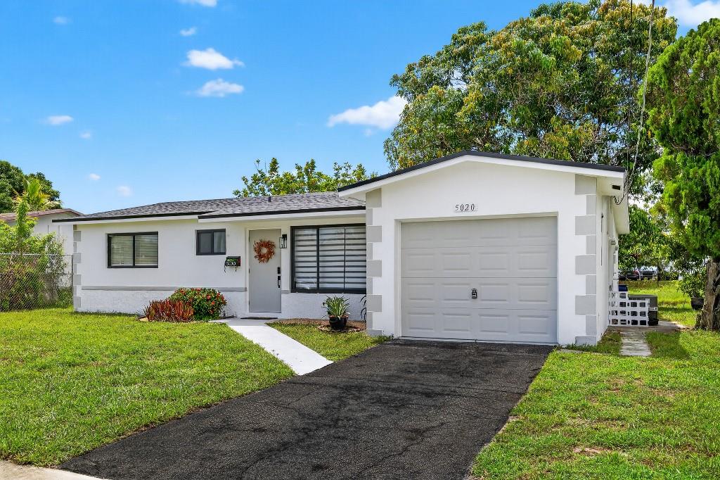 Welcome home to this stunning 3-bedroom, 2-bathroom abode. This home has been completely remodeled, and is move-in ready! Located in Lauderhill, this home features a fully updated interior with stylish vinyl and tile flooring throughout. The home is equipped with impact glass windows for added security and energy efficiency, and it boasts a brand-new roof and water heater for peace of mind. The kitchen is a dream, featuring an island and brand-new Samsung appliances. The backyard looks out onto a canal, with tall trees offering a shaded, tranquil, and breezy outdoor space. Don’t miss out on this beautifully updated property—schedule a showing today!