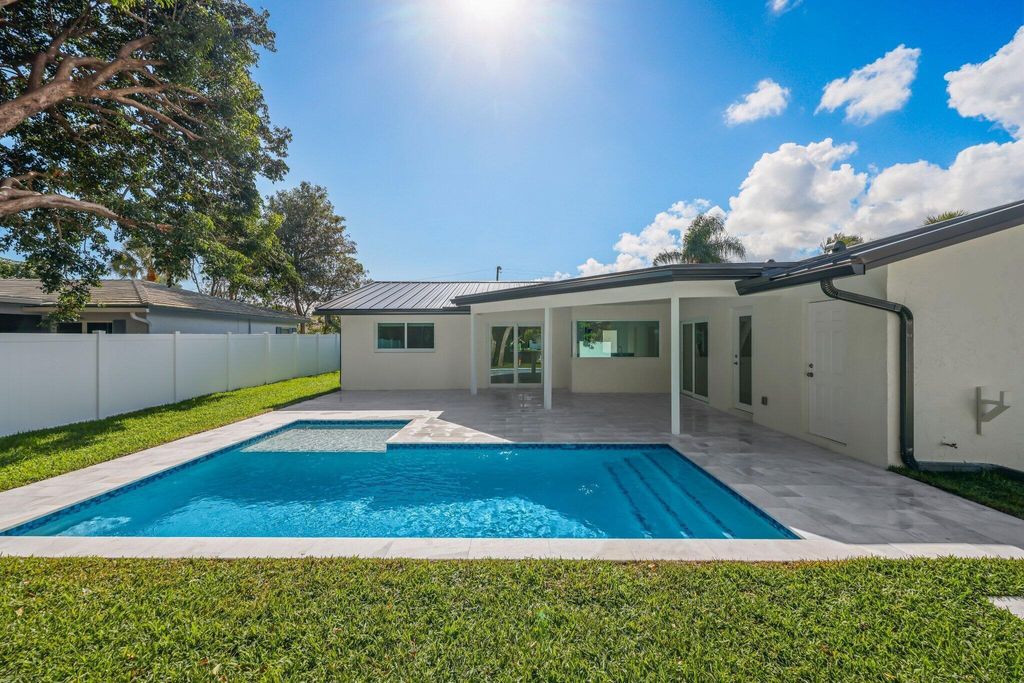 Photo of 979 NW 8th Street, Boca Raton, FL 33486 (MLS # B26024312)
