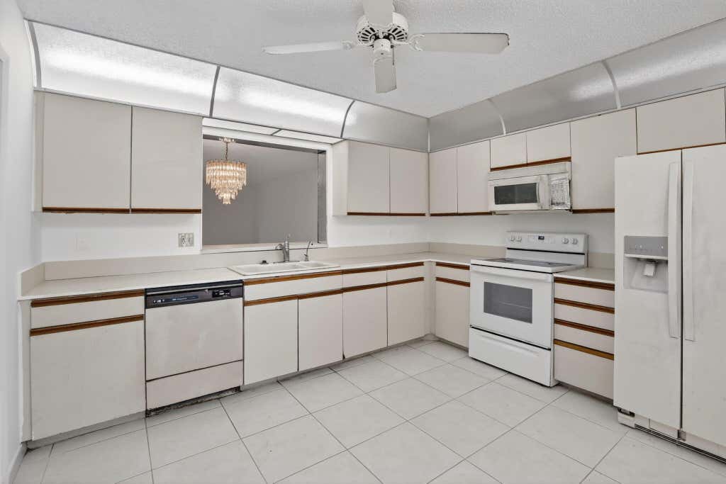 Photo of 250 S Hollybrook Terrace #208, Pembroke Pines, FL 33025 (MLS # B26062951)