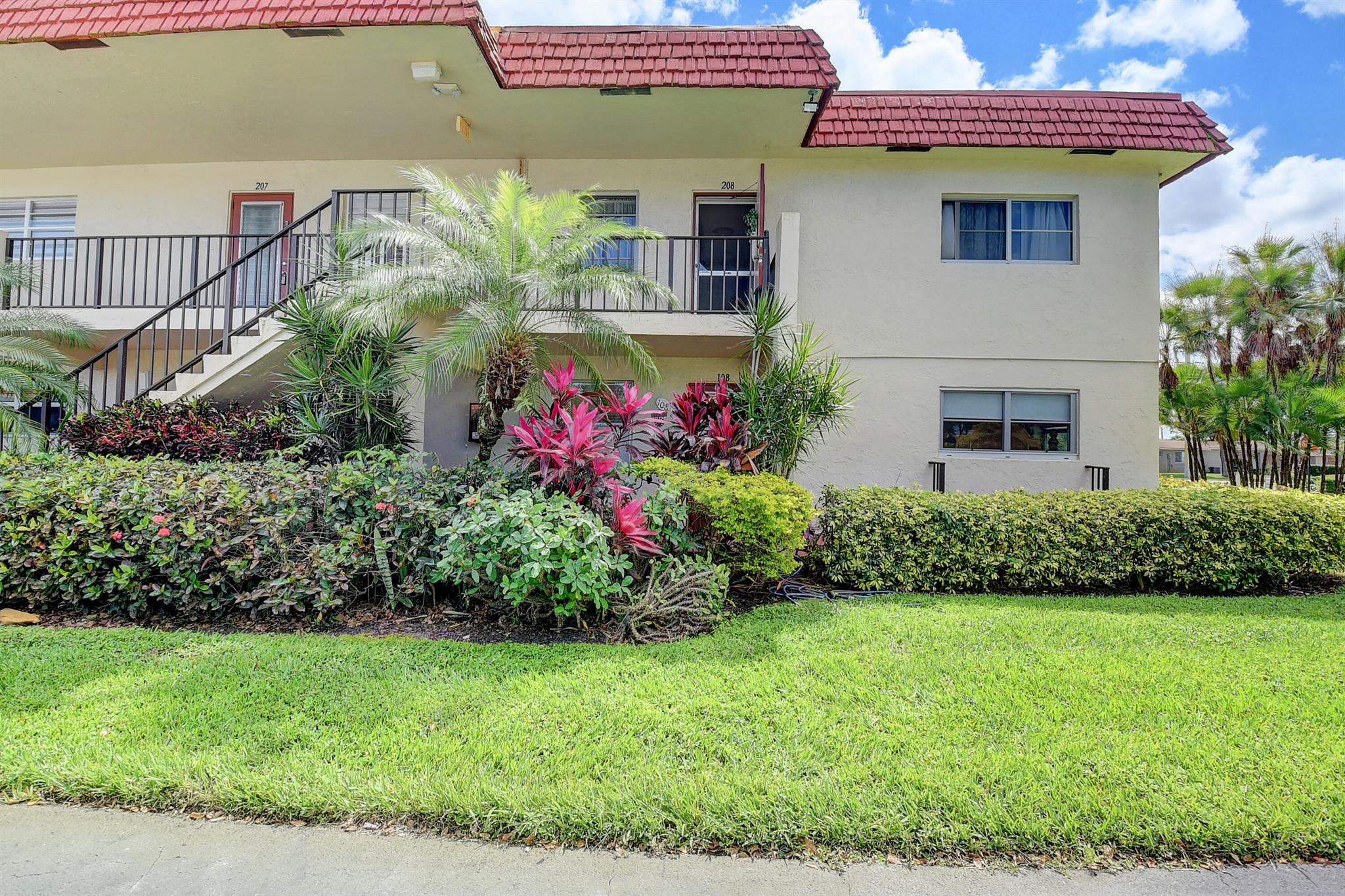 Welcome to 5 Abbey Lane, Unit 108--a light-filled corner residence in the desirable 55+ Abbey Village community of Villages of Oriole. This inviting condo is offered fully furnished and turnkey, allowing you to move right in and immediately enjoy the South Florida lifestyle. Featuring impact glass throughout, the home provides both comfort and peace of mind. As a corner unit, it enjoys extra natural light and privacy, creating a bright and welcoming atmosphere. There is a community washer and dryer for each floor. Also, an extra storage unit.The hot water heater, dishwasher, stove and refrigerator are just a few years old. The primary and second bath have nice updates. No carpeting and only tile throughout. No special assessments and the roof was completed last year.