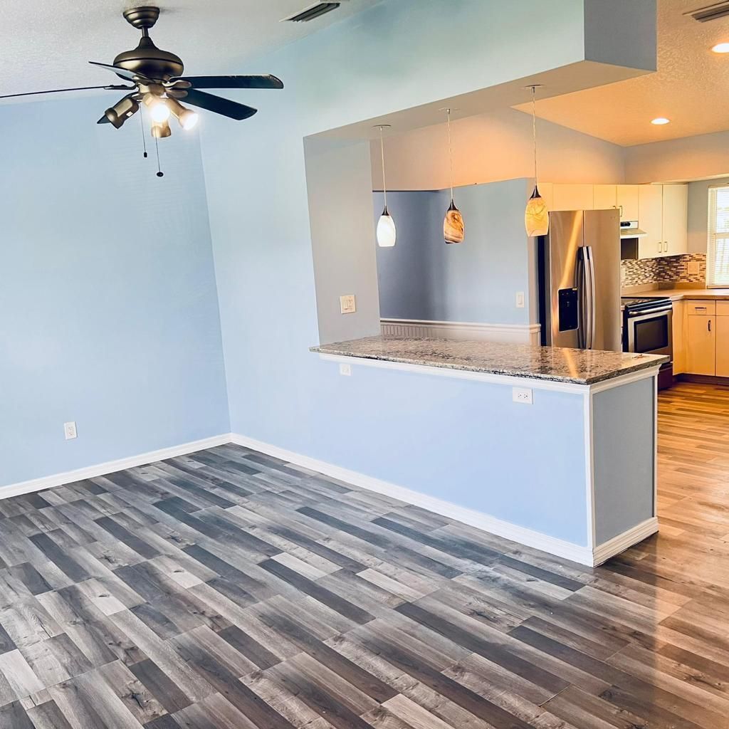 Photo of 1150 SW Haleyberry Avenue, Port Saint Lucie, FL 34953 (MLS # R10971373)