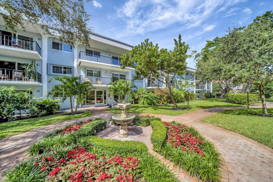 Exceptional first-floor corner unit 2-Bdrm, 2-Bath urban retreat on Middle River. Renovated unit features private patio entrance, allowing for parking outside your door! High-end features incl modern open kitchen & 2 renovated baths w/custom vanities & designer tilework. Spacious primary suite incl walk-in closet & ensuite bath. Hurricane impact windows & sliders, AC 2018, Water Heater 2024 & fiber optic high-speed internet. Well-managed & well-funded community w/reserves (SIRS/Reserve complete). Numerous upgrades: new roof (2023), exterior paint (2025), updated landscaping/irrigation system & renovated interior lobbies& hallways (2025). Amenities incl waterfront clubhouse & onsite manager. Secured building w/lobby entry-call box & quick access to beach, the Drive, shops & nightlife! Unit has been freshly painted...with all new interior doors!  You will love living here!