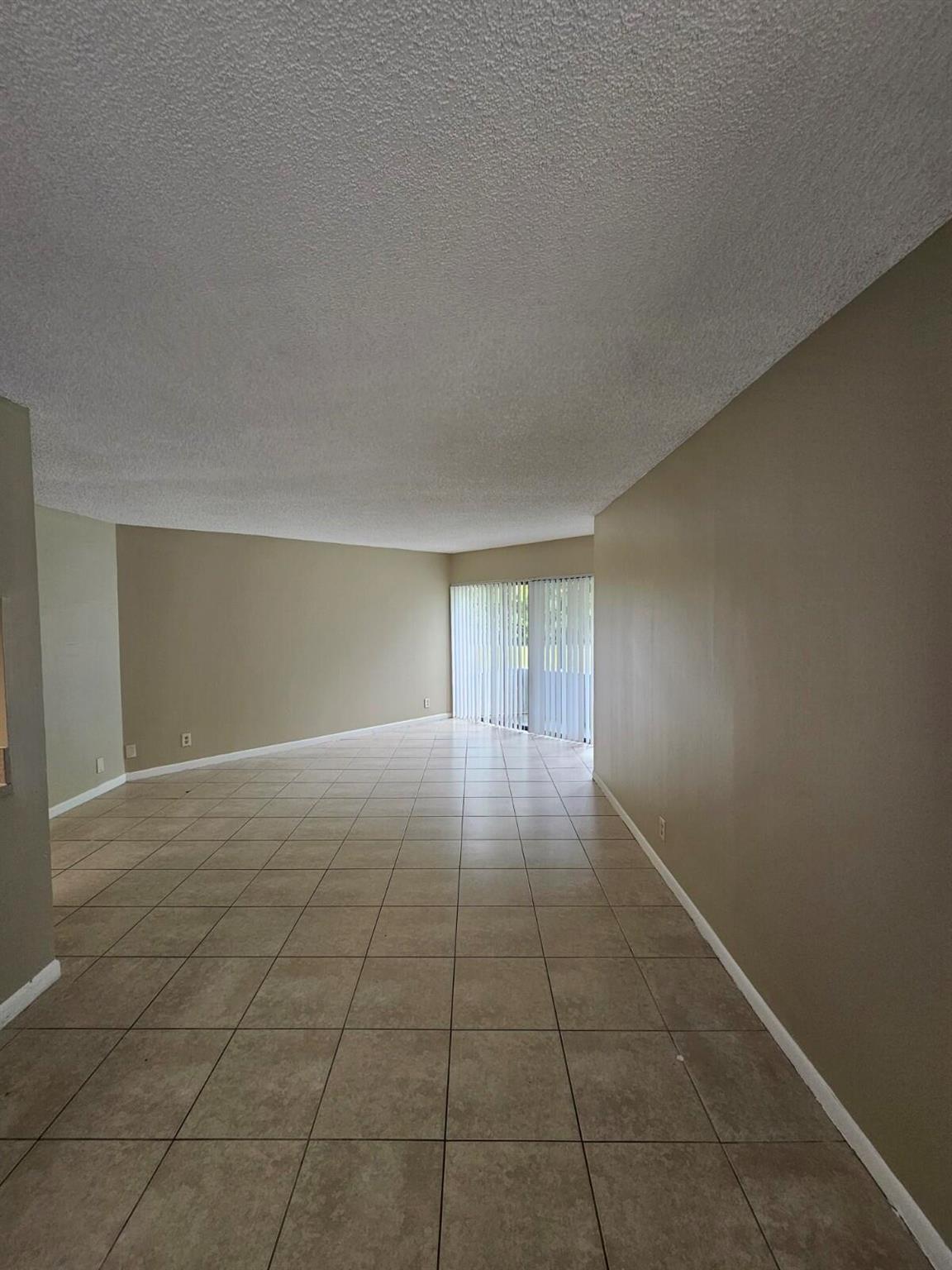 Spacious and well-maintained 1 bed + 1 bath first-floor condo in the heart of West Palm Beach! Freshly painted, tile flooring throughout, newer stainless steel appliances, and a Brand new A/C under manufacturer warranty. Features a large walk-in closet, open layout, and laundry room on the same floor. Investor-friendly community, rent from day one, offering excellent income potential! Walking distance to West Palm Beach Outlets, restaurants, and entertainment, and just minutes to I-95, Downtown, and beaches. Perfect as a primary residence or rental investment opportunity!