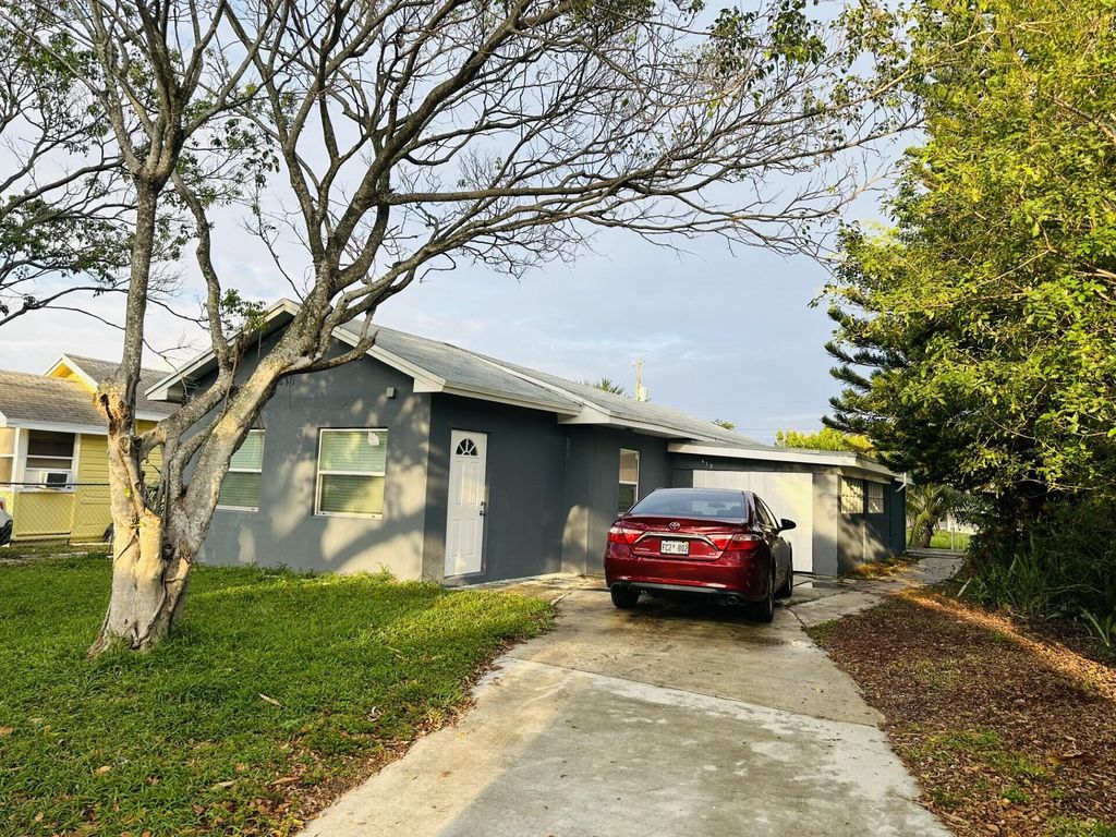 Photo of 410 N E Street, Lake Worth Beach, FL 33460 (MLS # R10967374)