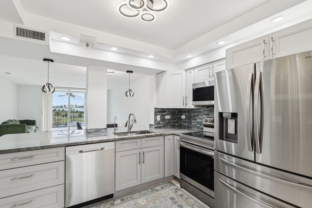 Photo of 14575 Bonaire Boulevard #403, Delray Beach, FL 33446 (MLS # R11159068)