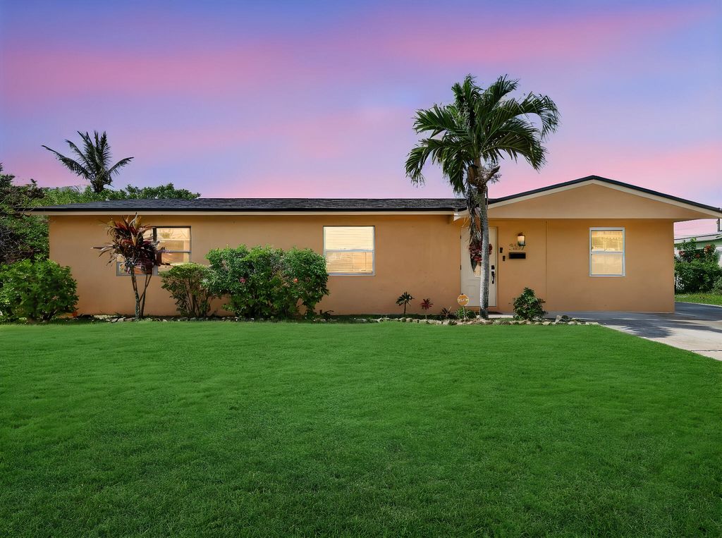 Photo of 361 W 21st Street, Riviera Beach, FL 33404 (MLS # B26027802)