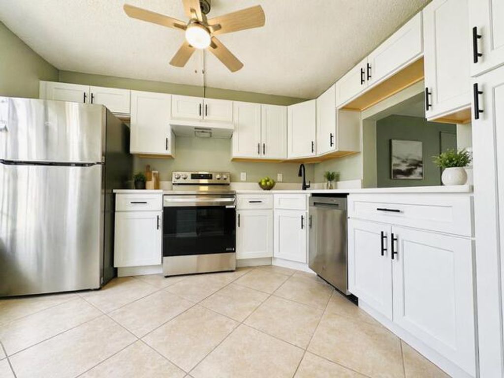 Photo of 222 Foxtail Drive #E, Greenacres, FL 33415 (MLS # B26032096)