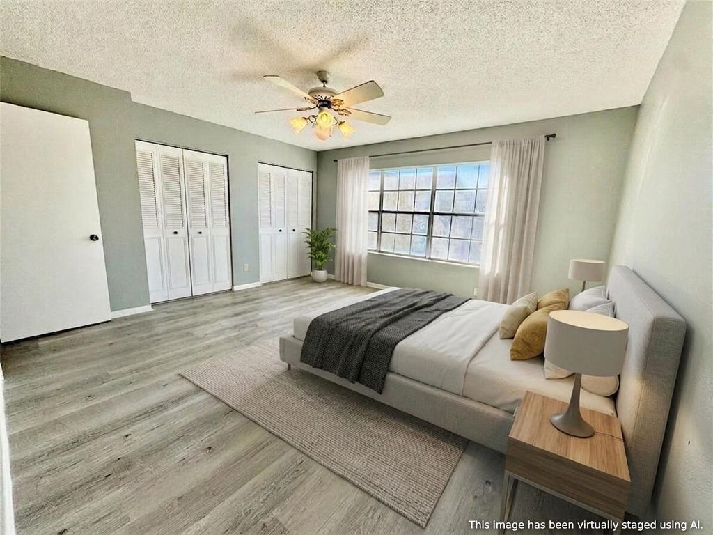 Photo of 222 Foxtail Drive #E, Greenacres, FL 33415 (MLS # B26032096)