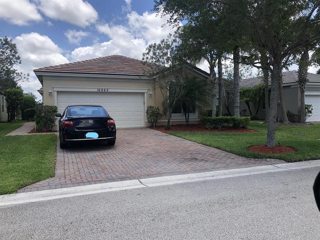 Photo of 10062 SW Chadwick Drive, Port Saint Lucie, FL 34987 (MLS # R10722401)