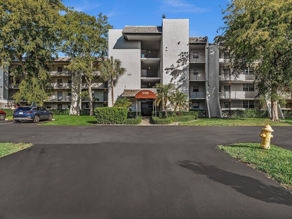Photo of 9470 Poinciana Place #303, Davie, FL 33324 (MLS # B26021091)