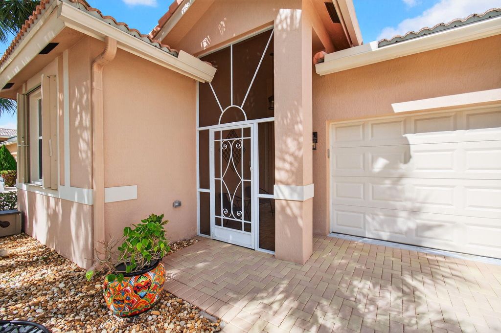 Photo of 9503 Sandpiper Lane, West Palm Beach, FL 33411 (MLS # R11165735)