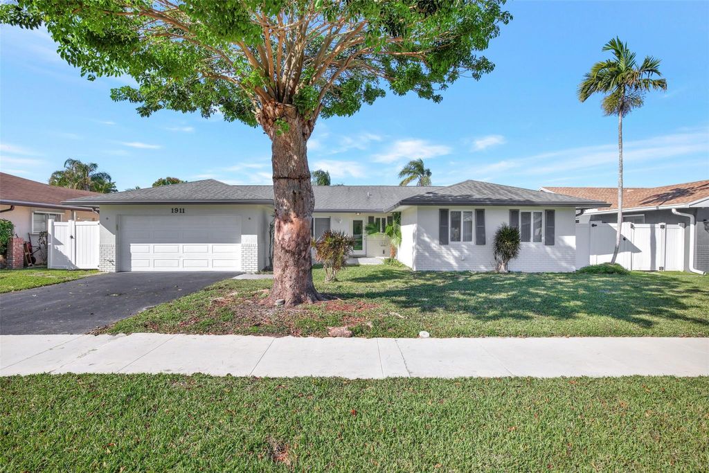 Photo of 1911 NW 40th Court, Oakland Park, FL 33309 (MLS # F10421620)
