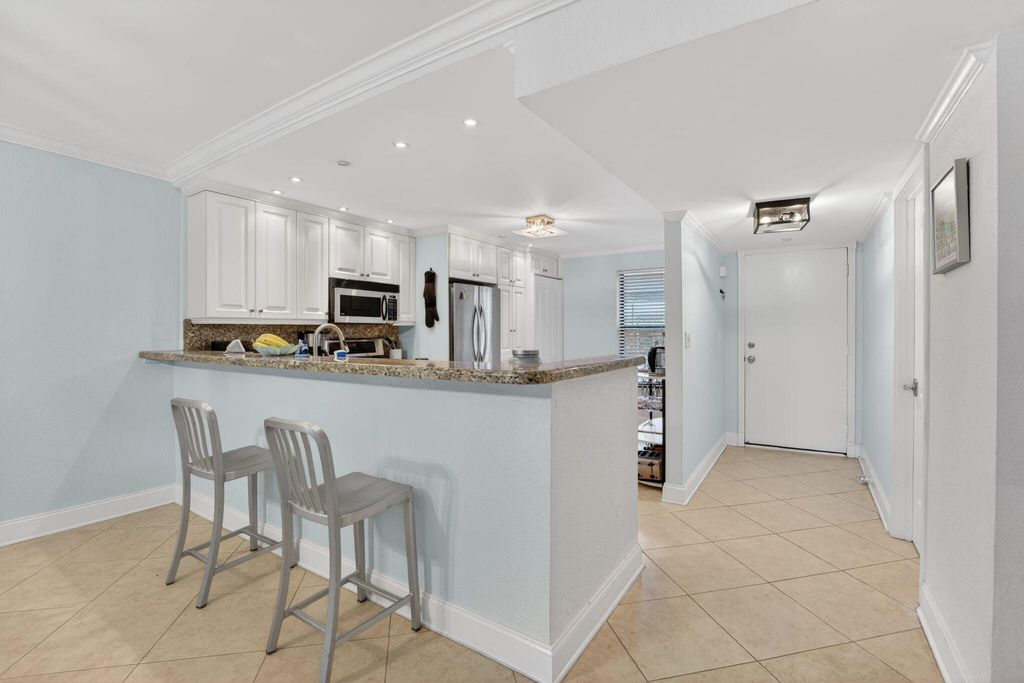 Photo of 1627 Riverview Road #110, Deerfield Beach, FL 33441 (MLS # B26034852)
