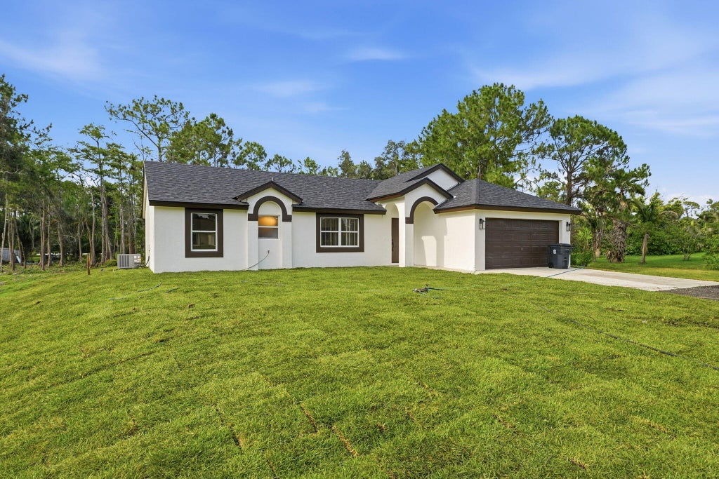 Photo of 16825 81st Lane N, The Acreage, FL 33470 (MLS # B26042950)