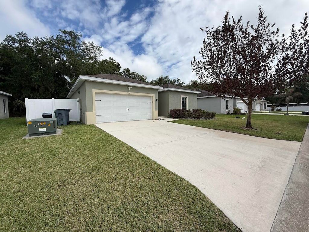 Photo of 5234 Oakland Lake Circle, Fort Pierce, FL 34951 (MLS # B26013456)