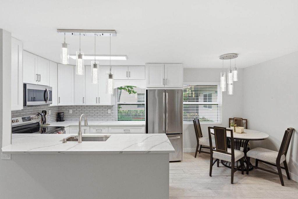 Photo of 634 Normandy N, Delray Beach, FL 33484 (MLS # B26016751)