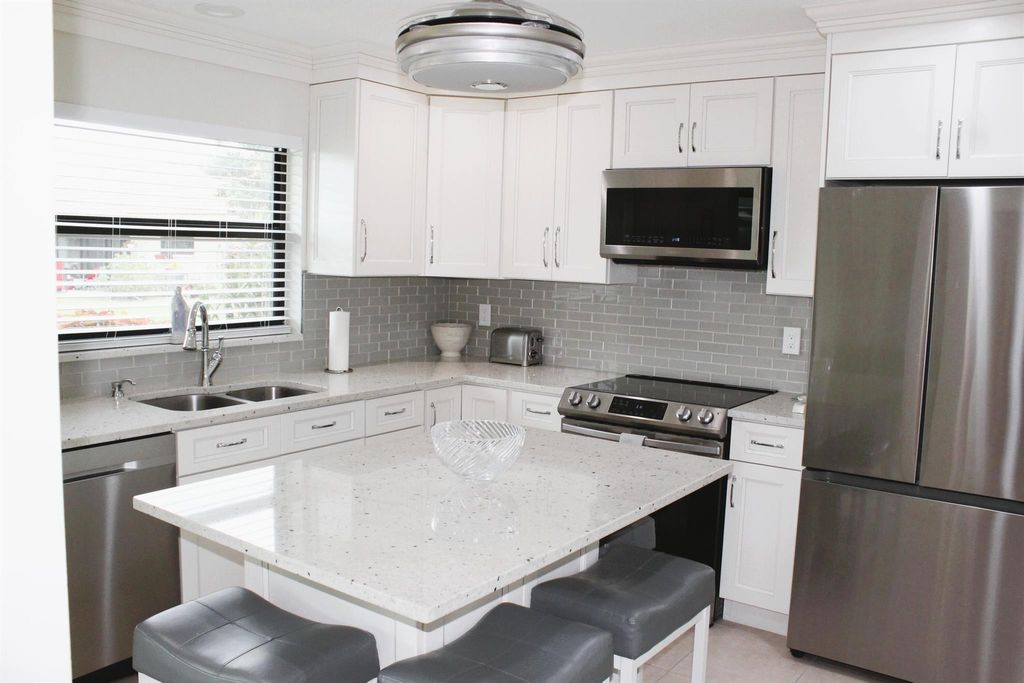 Photo of 4595 Laurel Tree Road #A, Boynton Beach, FL 33436 (MLS # R11138671)