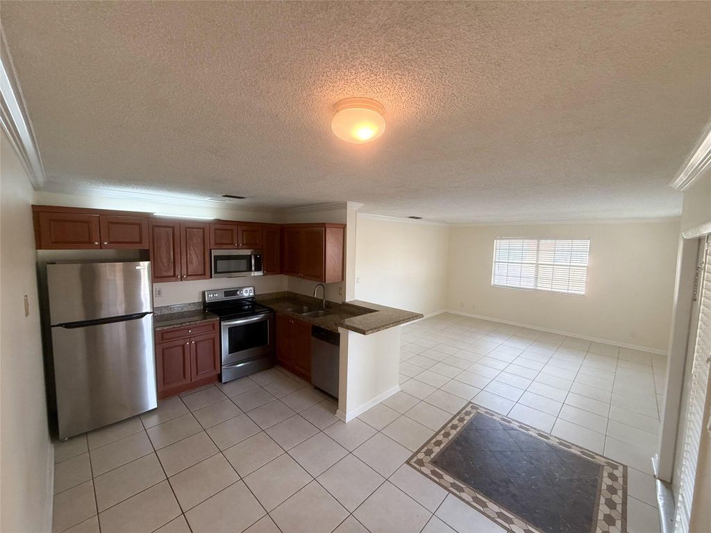 Photo of 11474 NW 42nd Street #11474, Coral Springs, FL 33065 (MLS # F10534387)