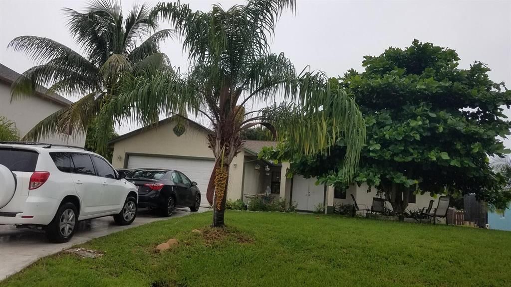 Photo of 2361 SW Freeman Street, Port Saint Lucie, FL 34953 (MLS # R10758389)