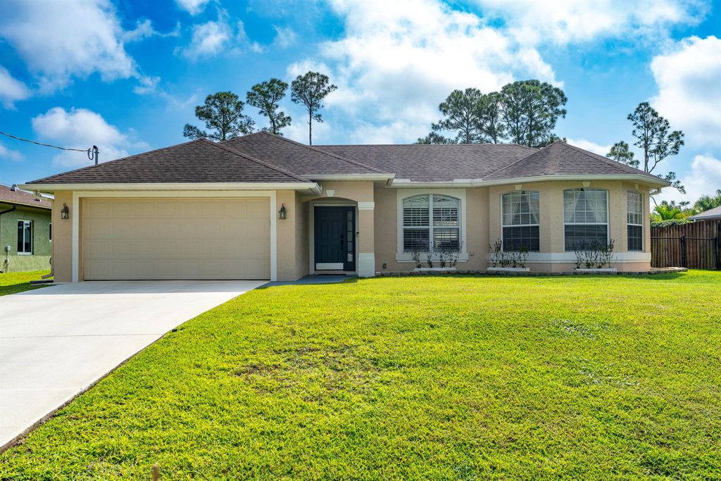 Photo of 3541 SW Kromrey Street, Port Saint Lucie, FL 34953 (MLS # R11078541)