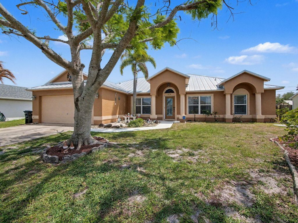 Photo of 2674 SE Creston Lane, Port Saint Lucie, FL 34952 (MLS # B26020413)