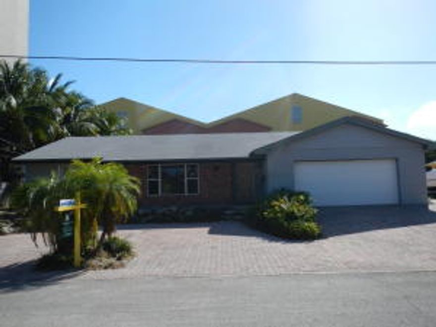 Waterfront gem located on a short canal adjacent to the Intracoastal Waterway. views of the Intracoastal from a small seawall of 21'. May be used for small watercraft or wave runners.