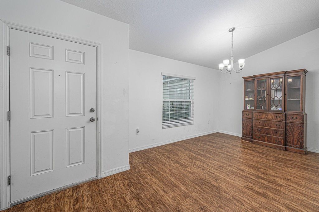 Photo of 654 SW Backert Avenue, Port Saint Lucie, FL 34953 (MLS # R10966071)