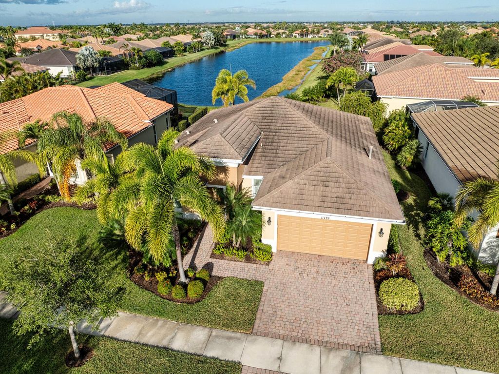 Photo of 11439 SW Apple Blossom Trail, Port Saint Lucie, FL 34987 (MLS # R11151090)
