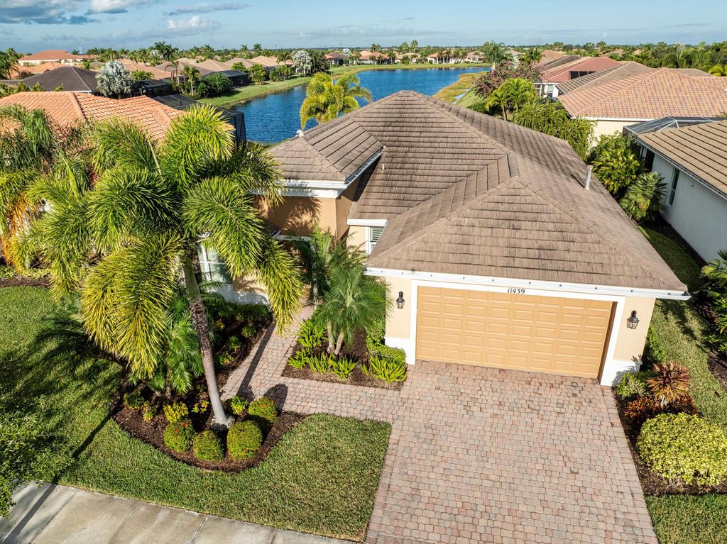 Photo of 11439 SW Apple Blossom Trail, Port Saint Lucie, FL 34987 (MLS # R11151090)