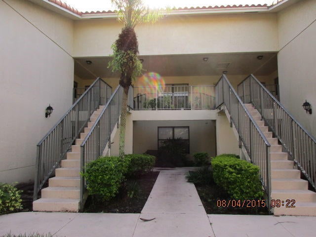 Photo of 1680 WINDORAH Way #E, West Palm Beach, FL 33411 (MLS # B26071566)