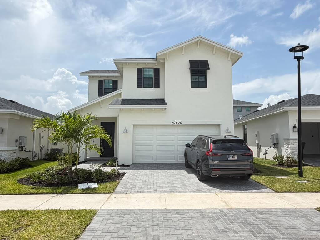 Photo of 10676 NW Wilgrove Lane, Port Saint Lucie, FL 34987 (MLS # B26078112)