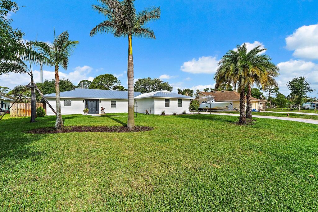 Photo of 5883 Set N Sun Place, Jupiter, FL 33458 (MLS # R11166583)