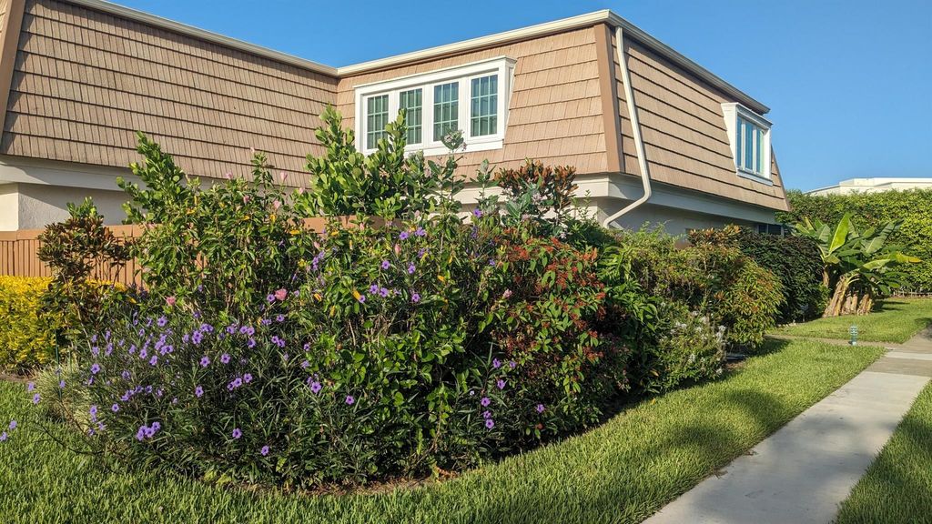 Photo of 11645 Ficus Street #D, Palm Beach Gardens, FL 33410 (MLS # R10911278)