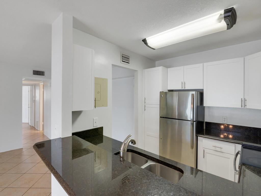 1st floor end unit directly on the canal. The only water view is from the porch. Boat docks located right outside porch door. Kitchen has been opened up to make bar seating. S/S appliances and granite tops. Terrific location between both bridges and directly across from Miracle Mile. Community pool with kayak storage and clubhouse. Water, sewer and trash included. No smoking in unit. No pets. No age restriction.
Close