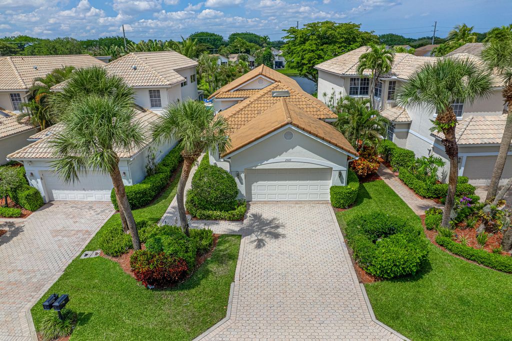 Photo of 2489 NW 66th Drive, Boca Raton, FL 33496 (MLS # B26023069)