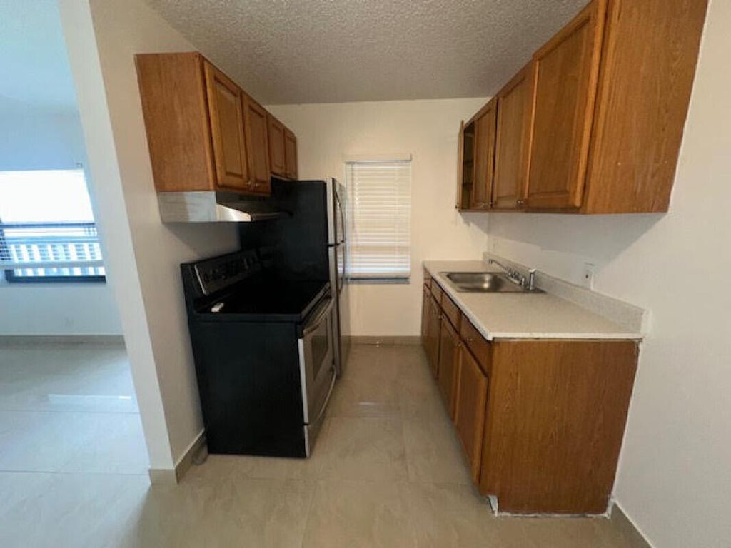 Photo of 889 Riverside Drive #206, Fort Lauderdale, FL 33312 (MLS # B26023392)